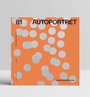 Okładka numeru z szarymi kropkami na pomarańczowym tle