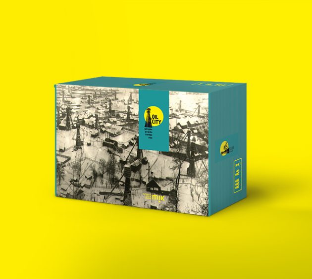 pudełko z grą Oil City na żółtym tle
